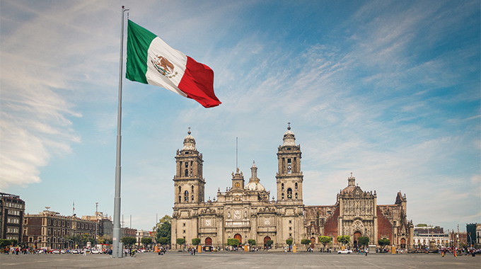 Mexican flag flying over Zocalo plaza