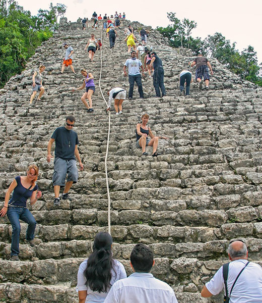 People climb Nohuch Mul in the  ancient Maya city of Coba, near Tulum, Mexico,Photo by Eric Franks / Alamy Stock Photo
